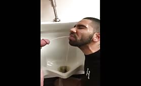 Pissing a slut in a public bathroom